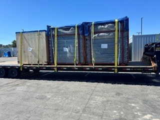 Cargo containers on flatbed
