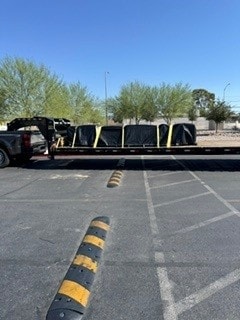 Heavy machinery on flatbed