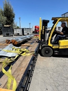 Forklift loading lumber